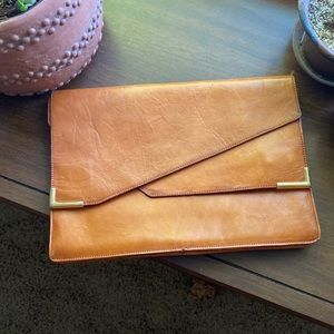 True vintage leather envelope purse.